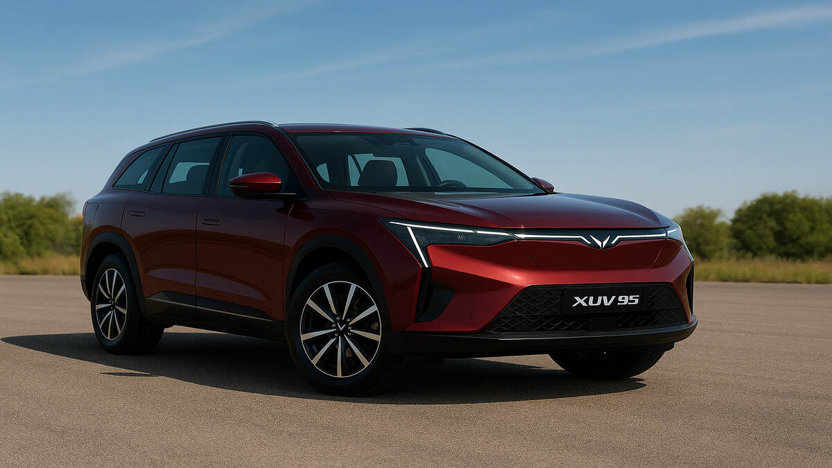 Mahindra XEV 9S in deep red shown in a front three-quarter angle, parked outdoors on a sunny day with a clean background.